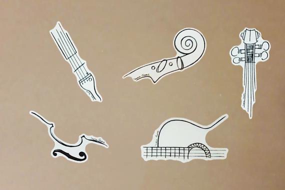 Pack vinilos adhesivos musicales instrumentos transparentes violín viola cello piano guitarra arpa clarinete flauta oboe fagot trompeta trombón trompa tuba batería Maria Amorós